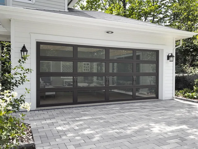 New London Garage Door Repair design specialist presenting custom garage door options to New London homeowner