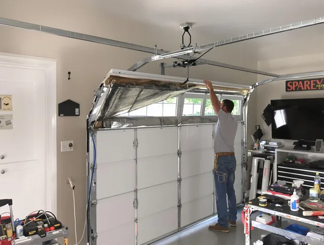 Garage door section replacement by New London Garage Door Repair in New London