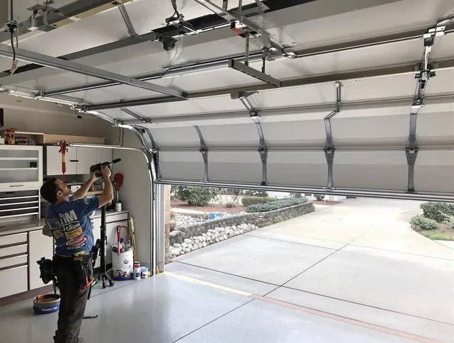 Garage door track repair service by New London Garage Door Repair in New London